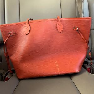 Damaged Louis Vuitton orange never full